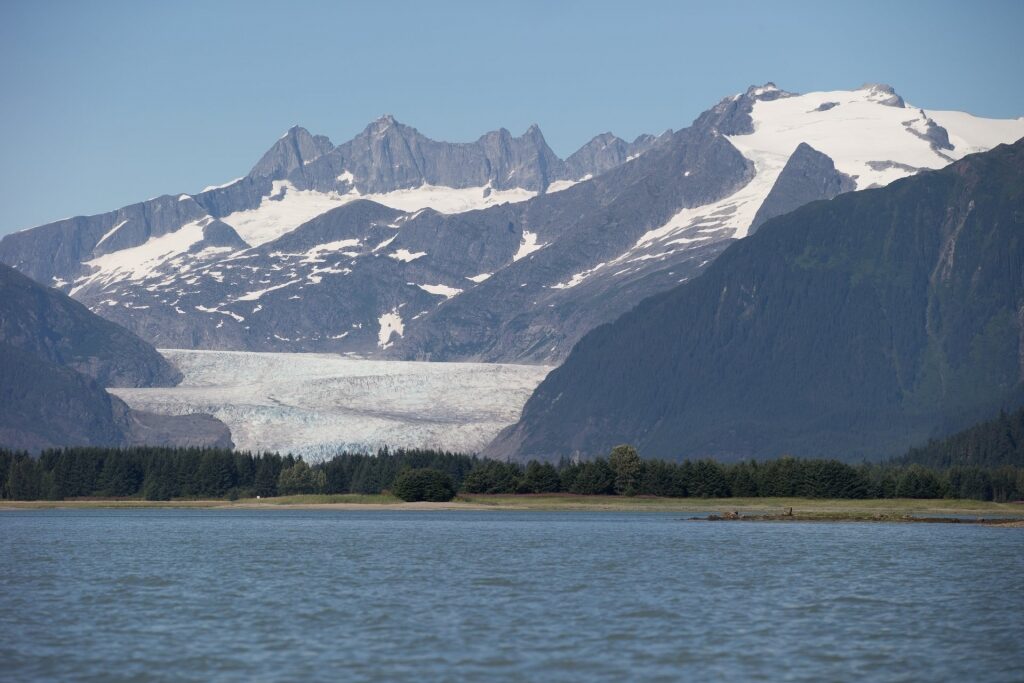 View of Mendenhall Glacier surrounded by snowy mountains