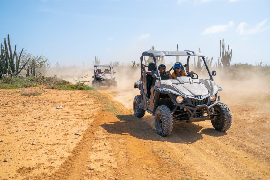 People on an ATV adventure in Arikok National Park