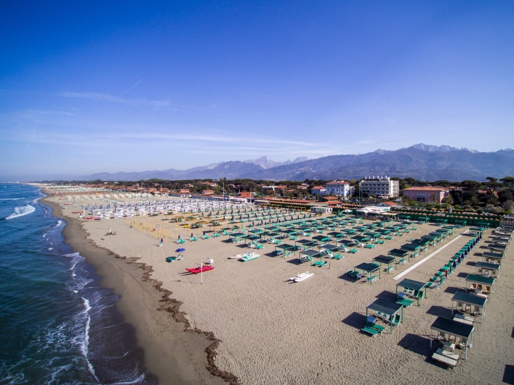 Beach chairs lined up on Forte dei Marmi, near Livorno