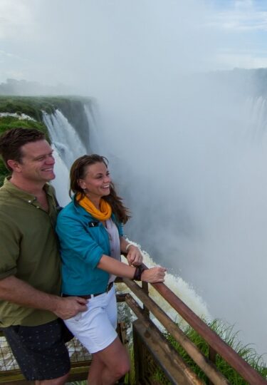 Couple looking at Iguazu Falls, Argentina
