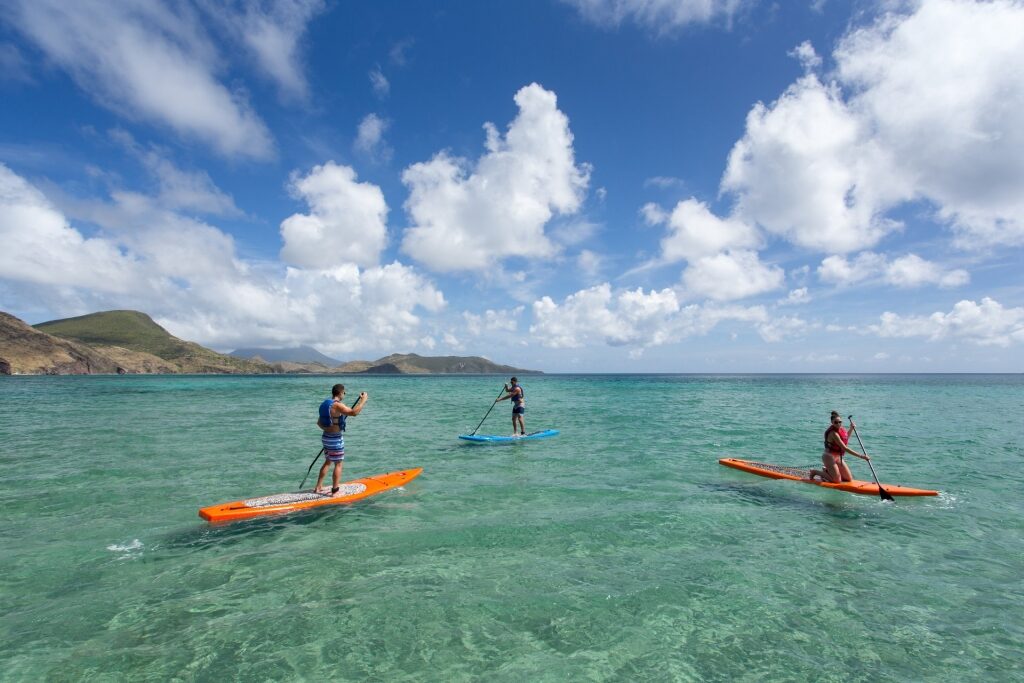 People paddleboarding in St. Kitts