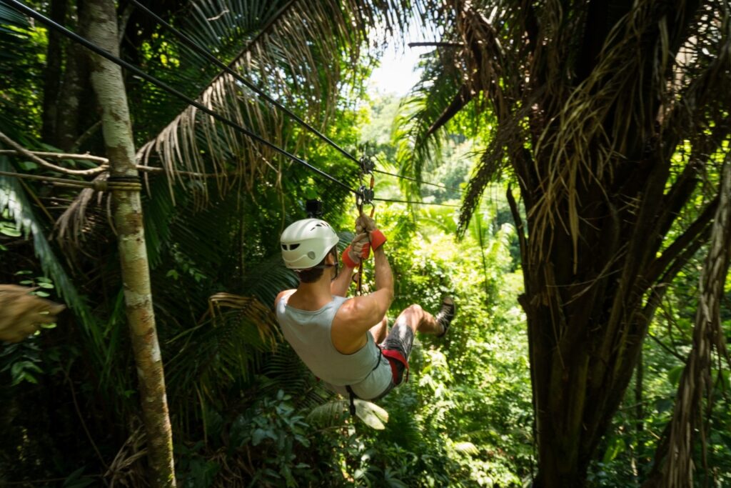Man ziplining in Belize