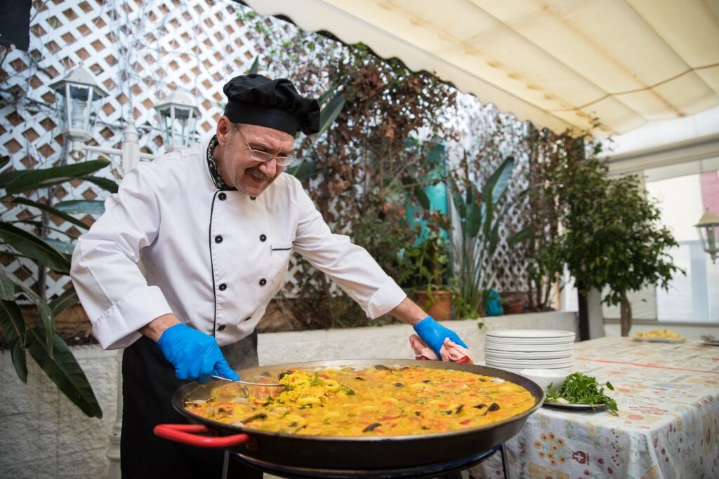 Try paella, one of the best things to do in Spain
