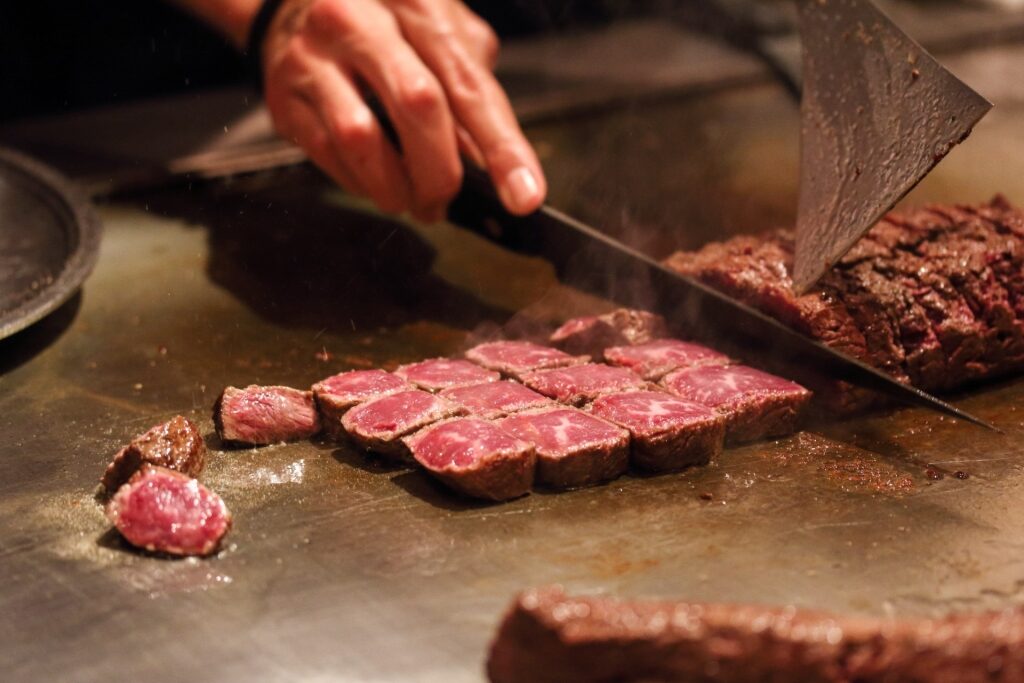 Chef preparing Kobe beef