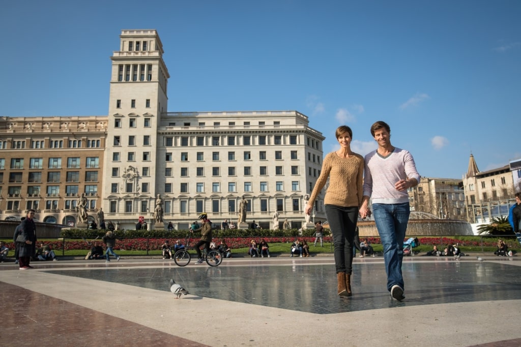 Couple exploring Barcelona in October