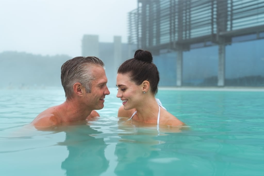 Couple enjoying the Blue Lagoon in Iceland