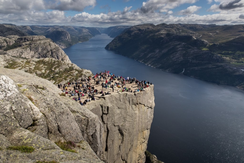 People sightseeing from Pulpit Rock, Norway