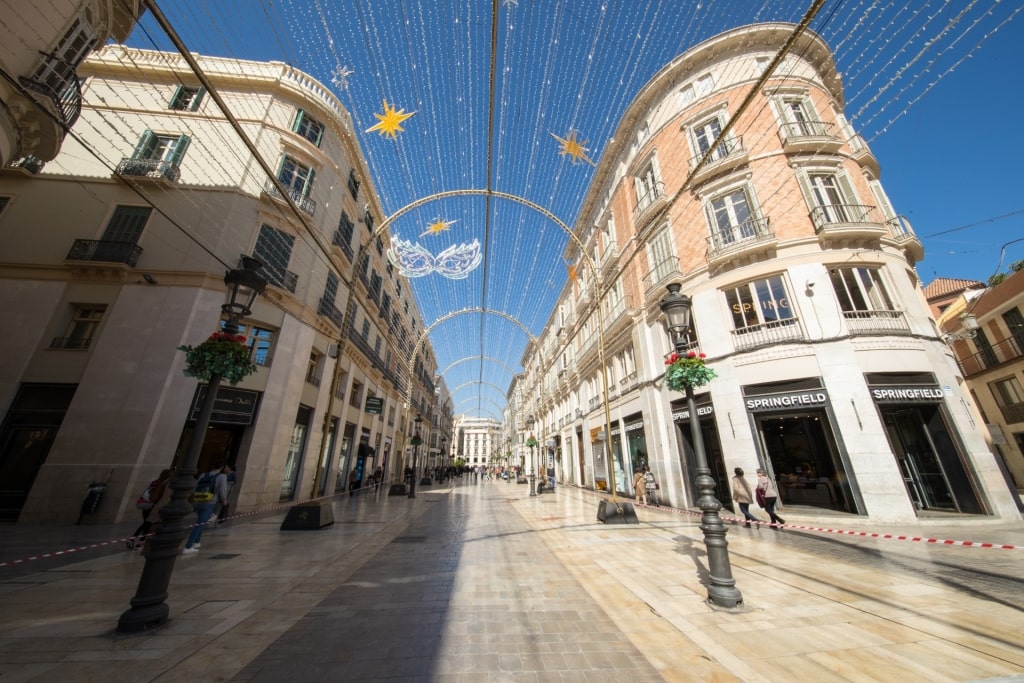 Street view of Calle Larios in Malaga Old Town