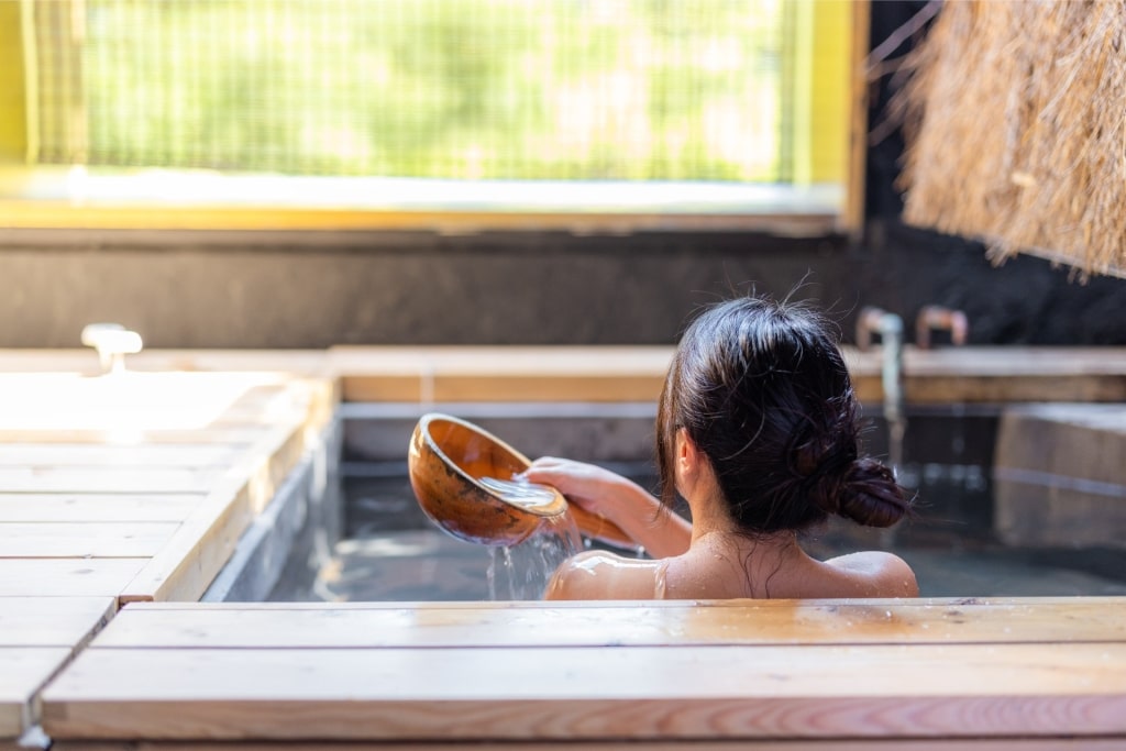 Woman enjoying Japanese onsen