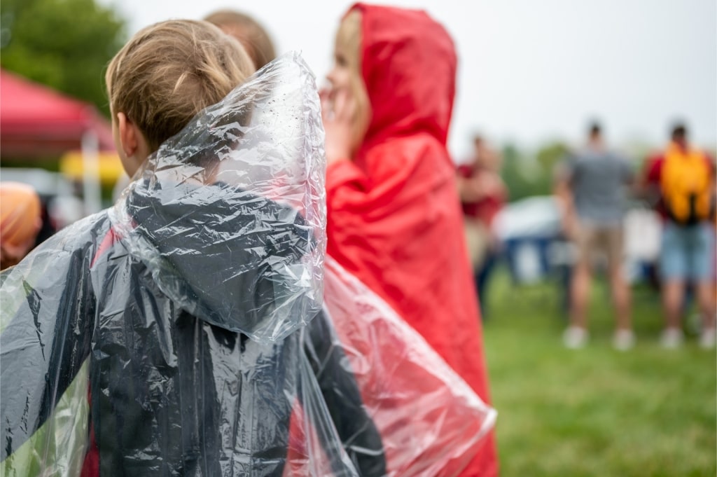 People wearing rain ponchos