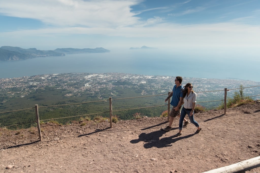 Couple strolling atop Mount Vesuvius