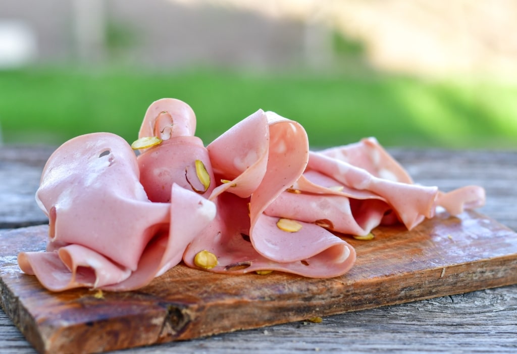 Slices of mortadella on a platter