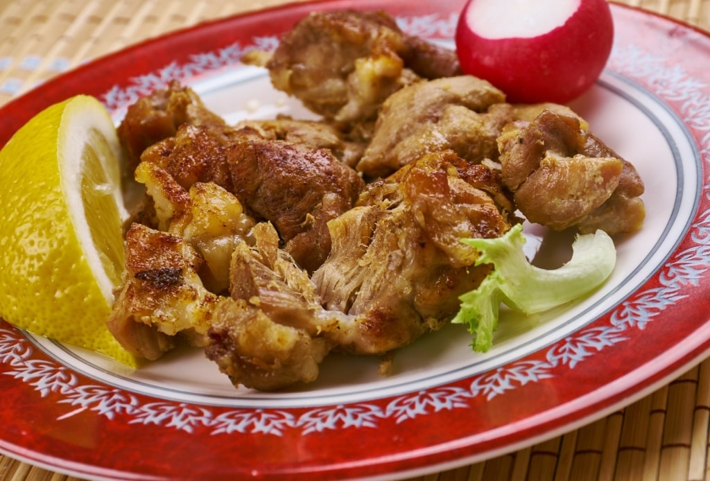 Plate of crispy lechón asado