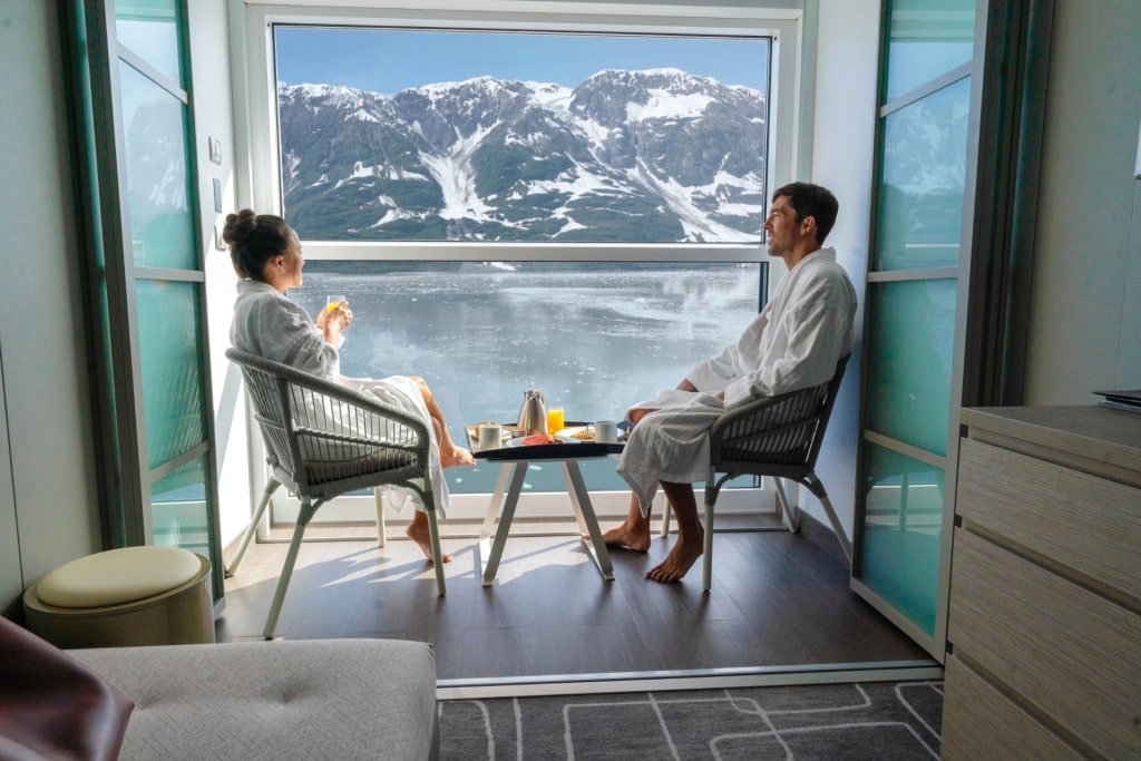 Couple relaxing aboard Celebrity Edge in Alaska