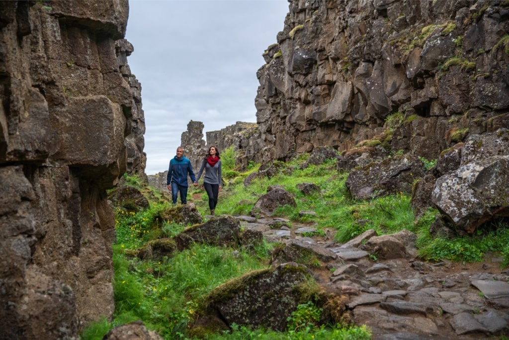 Couple exploring Thingvellir National Park