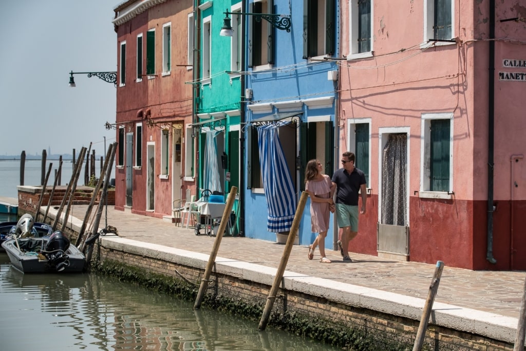 Couple exploring Burano, Venice