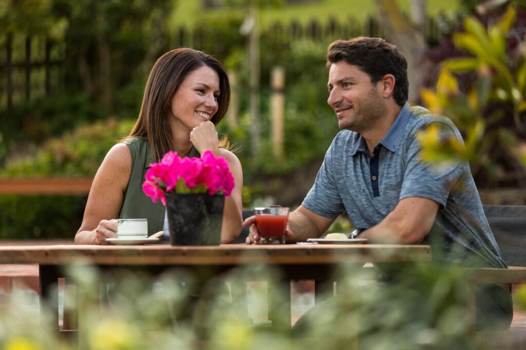 Couple drinking coffee in Christchurch, New Zealand