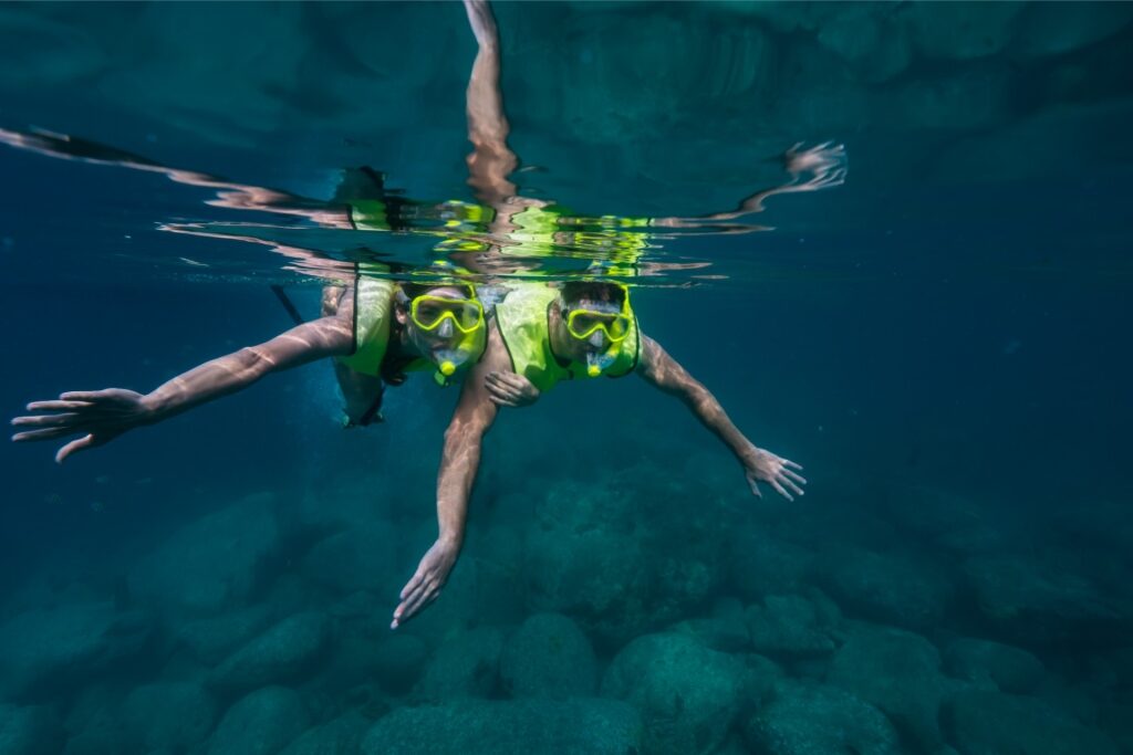 Couple snorkeling in St. Kitts