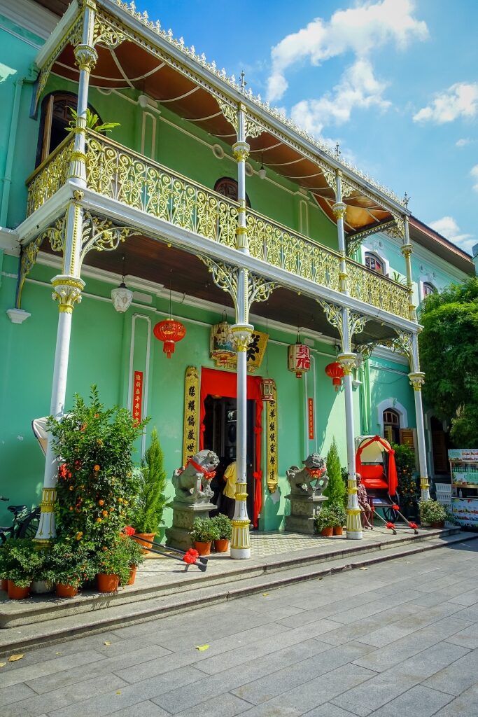 Green facade of Pinang Peranakan Mansion