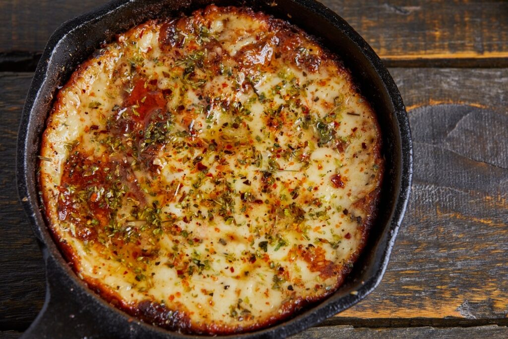 Delicious provoleta in a cast iron pan