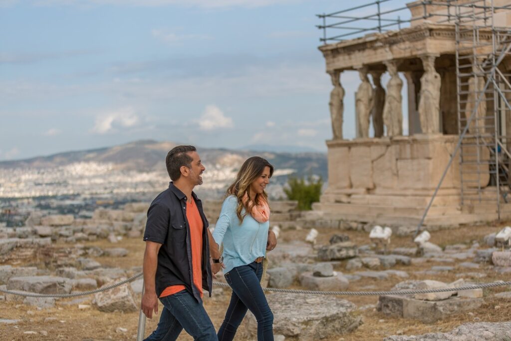 Couple exploring Acropolis in Athens, Greece