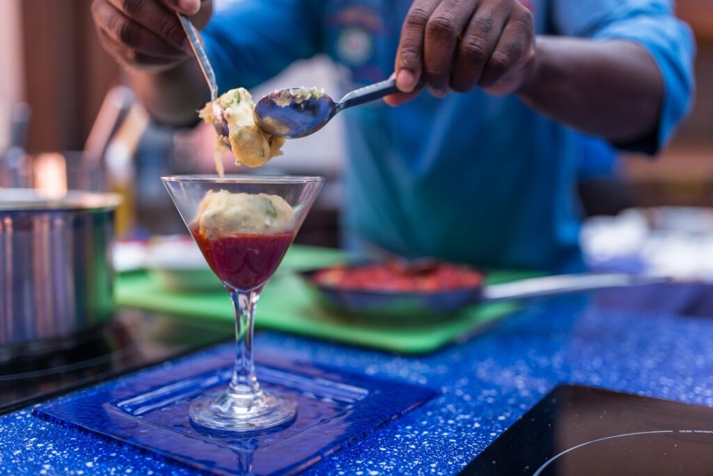 Local preparing authentic Bajan food