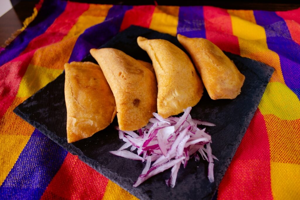 Plate of savory pastelitos de carne