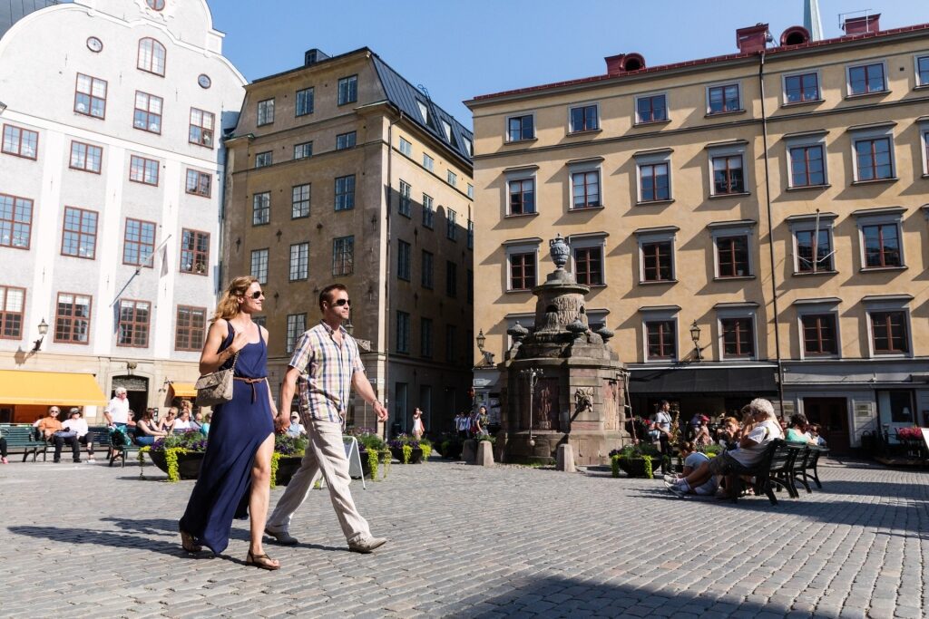 Couple exploring Gamla Stan in Stockholm