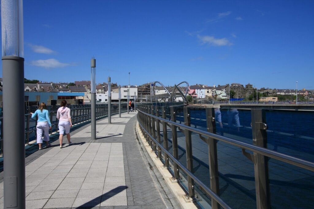 People walking the Celtic Gateway Bridge