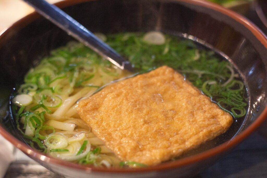 Bowl of warm kitsune udon