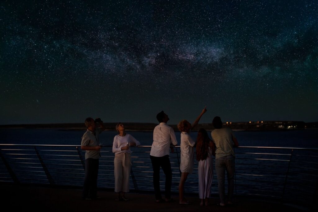 People stargazing aboard Celebrity Flora