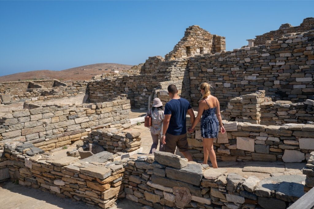 Couple exploring the historic sights in Delos