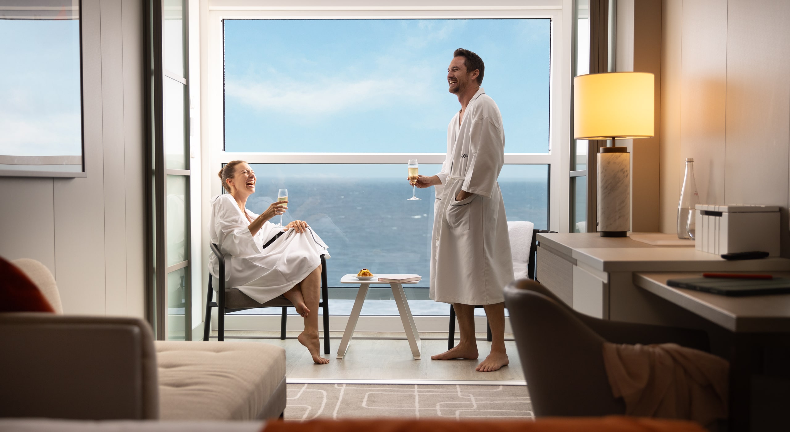 concierge class image showing couple with drinks